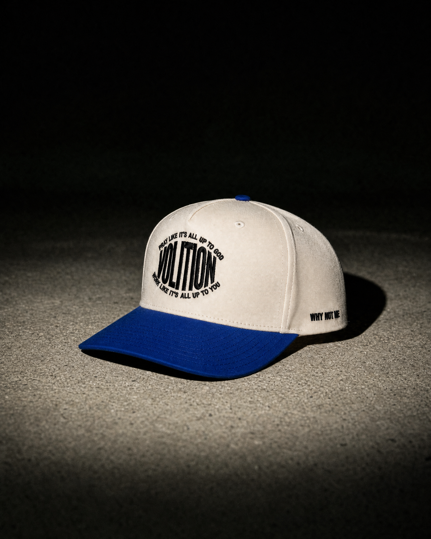 Volition five panel trucker hat, bone crown with royal blue brim